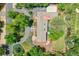 Stunning aerial view of the property showcasing landscaping, driveway, and beautiful roof at 4701 Homestead St, Bow Mar, CO 80123
