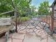 Unique metal garden gate creating an elegant entrance to a peaceful landscape at 4701 Homestead St, Bow Mar, CO 80123