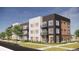 Modern apartment building featuring a mix of siding, brick, balconies, and large windows at 5702 N Central Park Blvd # 208, Denver, CO 80238