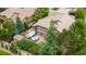 Aerial view of home featuring two hot tubs, patio, deck, shed, and well maintained backyard at 16458 W Ellsworth Dr, Golden, CO 80401
