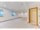 Unfinished basement with large windows and closet space, ready to be personalized at 16458 W Ellsworth Dr, Golden, CO 80401