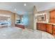 Bathroom featuring glass enclosed shower, soaking tub with fireplace, and vanity with wood cabinetry at 16458 W Ellsworth Dr, Golden, CO 80401