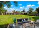 Relaxing backyard with a patio, outdoor seating, and lush green space, perfect for entertaining at 14544 March Dr, Denver, CO 80239