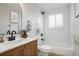 Updated bathroom featuring subway tile, modern fixtures, and a clean design at 14544 March Dr, Denver, CO 80239