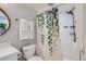 Bathroom featuring a walk-in shower with modern fixtures and stylishly decorated at 14881 Rider Pl, Parker, CO 80134