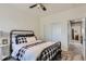 Comfortable bedroom featuring a ceiling fan, closet and neutral carpet, creating a cozy atmosphere at 14881 Rider Pl, Parker, CO 80134