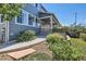 Charming home exterior featuring lush landscaping and a welcoming entrance at 14881 Rider Pl, Parker, CO 80134