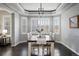 Bright dining room features hardwood floors and modern light fixture at 4495 Rainbow Ln, Broomfield, CO 80020