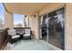 Spacious balcony with comfortable seating, offering a private outdoor space for relaxation and enjoyment at 6940 E Girard Ave # 210, Denver, CO 80224