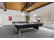 Billiard room featuring pool tables, wooden ceiling and interior decor at 6940 E Girard Ave # 210, Denver, CO 80224