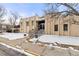 Apartment complex with a welcoming entrance, featuring stairs and a well-maintained exterior at 6940 E Girard Ave # 210, Denver, CO 80224