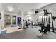 Well-equipped gym area featuring weight machines, free weights, and shower access at 6940 E Girard Ave # 210, Denver, CO 80224