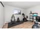 Home gym featuring modern exercise equipment and a sleek design, perfect for staying active at 6940 E Girard Ave # 210, Denver, CO 80224