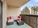 Relaxing outdoor patio with comfortable seating and a view of the surroundings at 6940 E Girard Ave # 210, Denver, CO 80224