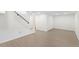 Finished basement with ample space, laminate flooring, and modern finishes, creating a functional area at 1238 Rosemary St, Denver, CO 80220