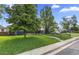 Charming home with a well-maintained front yard, mature trees, and a cozy curb appeal at 1238 Rosemary St, Denver, CO 80220
