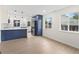Bright kitchen with stainless steel appliances, stylish cabinetry, and ample natural light at 1238 Rosemary St, Denver, CO 80220