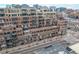 Large brick building with many balconies and windows at 1499 Blake St # 1F, Denver, CO 80202