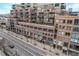 Brick building with many balconies and city views at 1499 Blake St # 1F, Denver, CO 80202