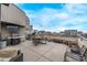 Rooftop deck with city views, grill, and ample seating at 1499 Blake St # 1F, Denver, CO 80202