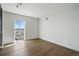 Bedroom with hardwood floors and large windows at 700 N Washington St # 1104, Denver, CO 80203