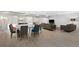 Bright community area with dining and lounge seating, modern flooring, and neutral decor at 700 N Washington St # 1104, Denver, CO 80203