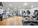 Spacious gym with various exercise equipment, mirrors, and hardwood floors at 700 N Washington St # 1104, Denver, CO 80203