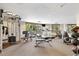 Well-equipped fitness center with cardio machines, weight equipment, and scenic outdoor views at 50 Mountain Thunder Dr # 1402, Breckenridge, CO 80424