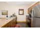 Functional kitchen with stainless steel appliances, dark cabinets, and a convenient breakfast bar area at 50 Mountain Thunder Dr # 1402, Breckenridge, CO 80424
