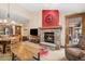 Inviting living room featuring a stone fireplace, open layout, and rustic wood accents throughout the room at 50 Mountain Thunder Dr # 1402, Breckenridge, CO 80424