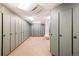 Locker room with rows of lockers, neutral carpeting, and adequate lighting at 50 Mountain Thunder Dr # 1402, Breckenridge, CO 80424