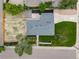 A bird's-eye view of a well-maintained home with a large backyard and freshly manicured landscaping at 4640 W Ellsworth Ave, Denver, CO 80219
