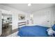 Spacious bedroom with lots of natural light and access to other parts of the home at 4640 W Ellsworth Ave, Denver, CO 80219