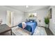 Inviting bedroom with a large window and neutral decor, creating a relaxing atmosphere at 4640 W Ellsworth Ave, Denver, CO 80219