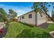 Charming home featuring a well-maintained lawn and classic architecture at 4640 W Ellsworth Ave, Denver, CO 80219