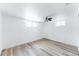 Bright and airy basement bedroom with ceiling fan and vinyl flooring at 12029 W Dakota Dr, Lakewood, CO 80228