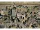 Aerial view showcasing the home's large lot, tennis court, and lush surroundings at 7 Mockingbird Ln, Cherry Hills Village, CO 80113