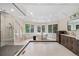 Elegant bathroom with a modern soaking tub, sleek glass shower, and double sink vanity offering abundant space at 7 Mockingbird Ln, Cherry Hills Village, CO 80113