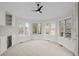 Spacious bedroom features bright bay window and built in bar area at 7 Mockingbird Ln, Cherry Hills Village, CO 80113