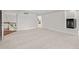 Open bedroom with fireplace, carpet and entryway to another room at 7 Mockingbird Ln, Cherry Hills Village, CO 80113