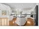 Large kitchen featuring granite countertops, a center island, and stainless steel appliances at 7 Mockingbird Ln, Cherry Hills Village, CO 80113