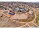Aerial view of school, showcasing the playground and sports court in a Gathering-friendly neighborhood at 10062 Eagle Valley Way, Highlands Ranch, CO 80129