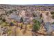 Aerial view of the home in a suburban neighborhood, showcasing the well-maintained landscaping and nearby community at 10062 Eagle Valley Way, Highlands Ranch, CO 80129