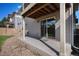 Concrete back patio with sliding glass door access at 3116 Jonquil St, Castle Rock, CO 80109