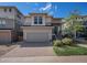 Charming two-story home with a modern design, two-car garage, and well-maintained brick driveway at 3116 Jonquil St, Castle Rock, CO 80109