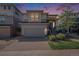 Charming two-story home with a modern design, two-car garage, and well-maintained brick driveway at 3116 Jonquil St, Castle Rock, CO 80109