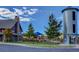 Community park featuring playground, trees and modern farm architecture at 3375 New Haven Cir, Castle Rock, CO 80109