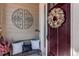 Charming front porch with a decorative wreath and comfortable seating area at 3375 New Haven Cir, Castle Rock, CO 80109