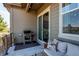 Cozy patio featuring outdoor seating, a grill, a sliding door and large windows at 3375 New Haven Cir, Castle Rock, CO 80109