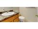 Simple powder room with a wooden vanity and a marble countertop at 812 Union St # B, Lakewood, CO 80401